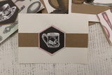 Beans and Bags: Black & Ivory Tea Cups Reverse Paper