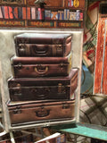 Architextures™ Treasures - Stacked Leather Suitcases